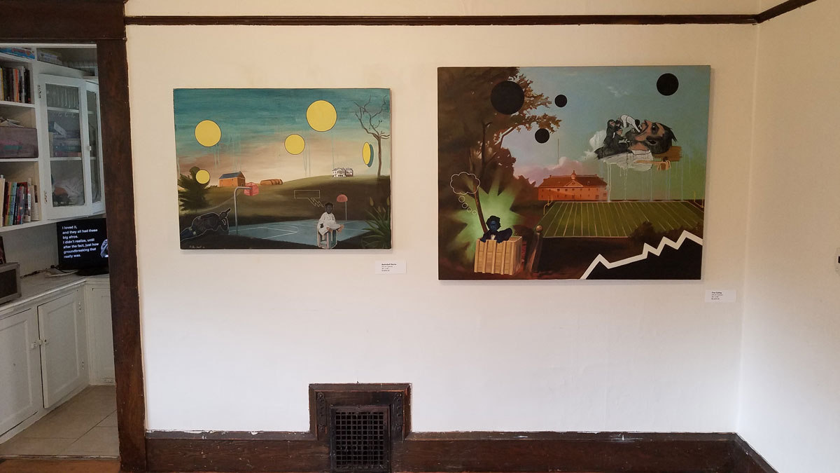 Two paintings hang on a wall in a domestic space.